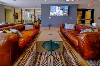 Expansive club room with fireplace, pool tables, full kitchen
